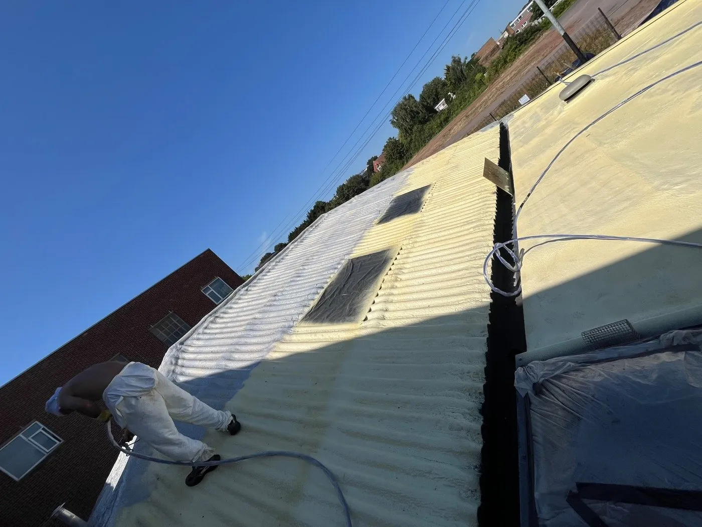 External roofing foam applied across the Dove Lane pitched and flat roofs