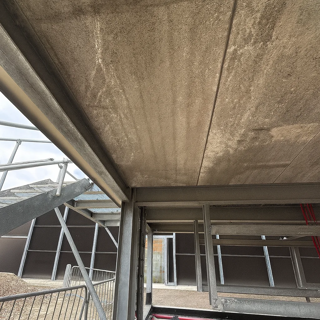 Before: the concrete undercroft soffit and access conditions.