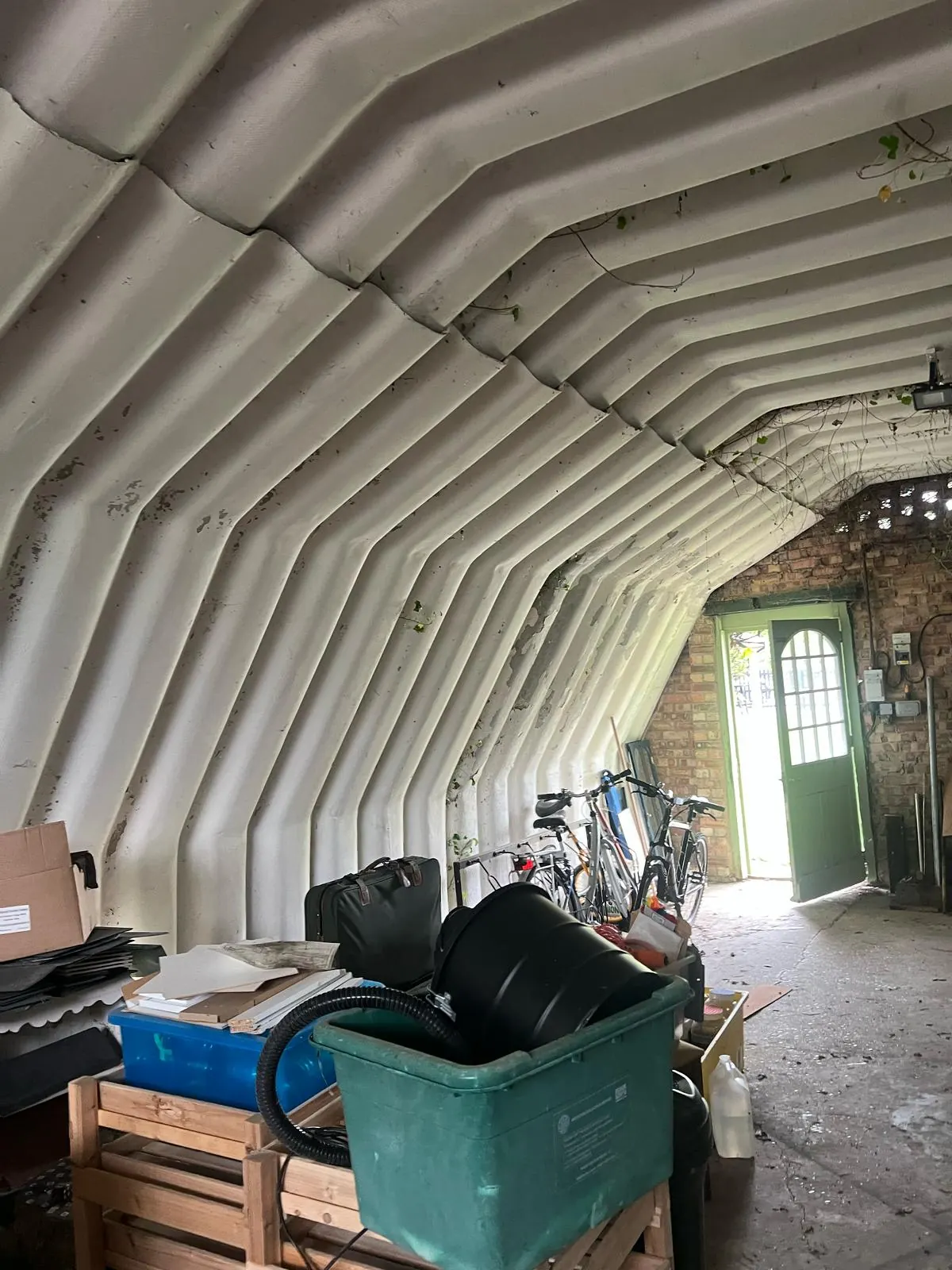 Spray foam insulation applied to Nissen huts — real Duratite Group project