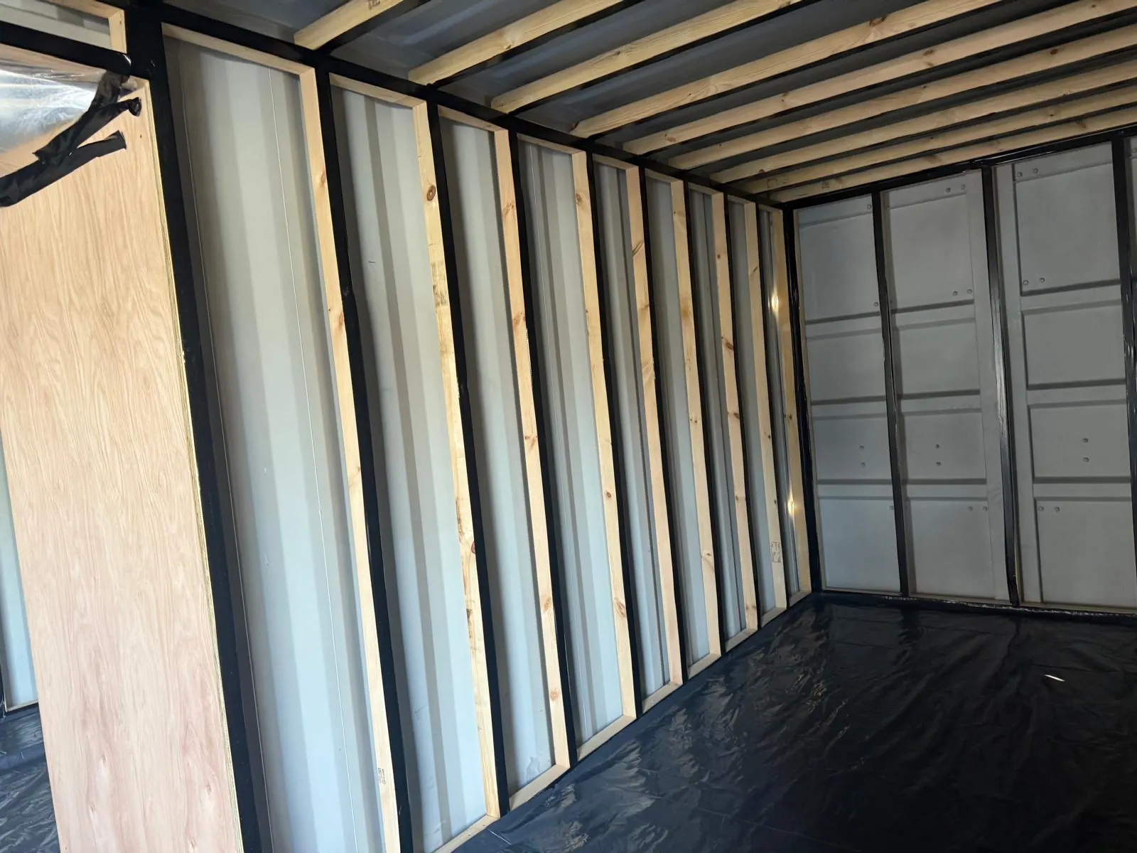 Spray foam insulation applied to modular buildings — real Duratite Group project