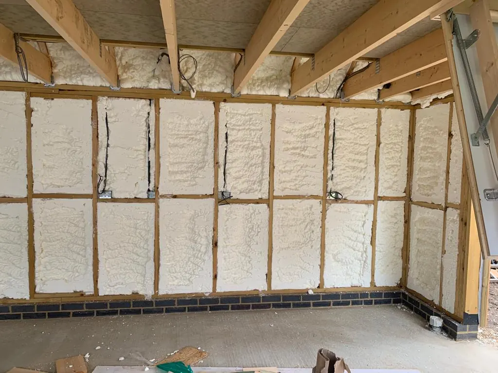 Enverge Sucraseal open-cell spray foam being applied