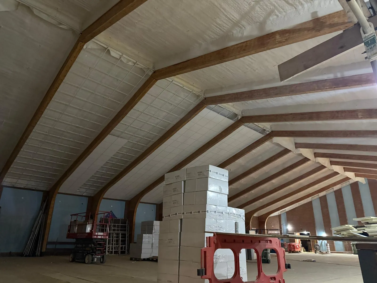 Spray foam insulation applied to pool halls — real Duratite Group project